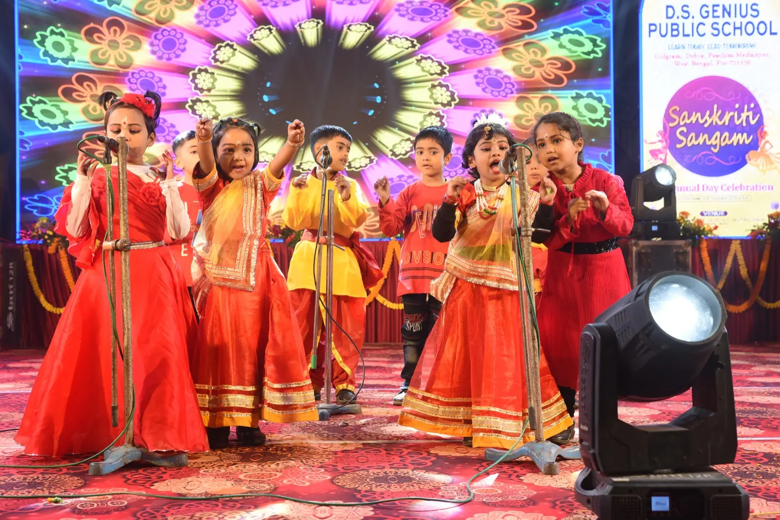 Students of D.S. Genius Public School at the school Annual Day. This photograph is not a record of desks already installed.